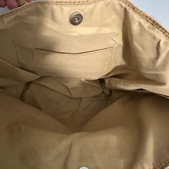 From Revolve Large Circle-Handle Tote Bag in Natural with Black Accents - Picture 2 of 2